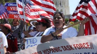 Immigration rights activists take part in a rally in front of the US Supreme Court in Washington, DC on November 12, 2019. - The US Supreme Court hears arguments on November 12, 2019 on the fate of the 'Dreamers,' an estimated 700,000 people brought to the country illegally as children but allowed to stay and work under a program created by former president Barack Obama.Known as Deferred Action for Childhood Arrivals or DACA, the program came under attack from President Donald Trump who wants it terminated, and expired last year after the Congress failed to come up with a replacement. (Photo by MANDEL NGAN / AFP)