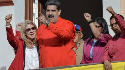 El presidente de Venezuela, Nicolás Maduro, junto a su esposa Cilia Flores. Foto: AFP