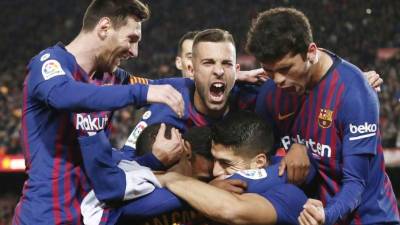La eufórica celebración del gol de Luis Suárez para el 1-0 del Barcelona ante Atlético. Foto AFP