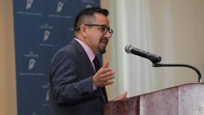 Yairsinio García habla este martes durante el 'Foro internacional de reformas electorales e identificación de personas' en Tegucigalpa. EFE