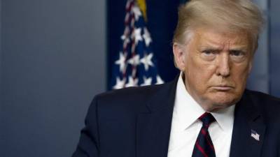 (FILES) In this file photo former US President Donald Trump arrives to speak at the press briefing at the White House in Washington, DC, on July 30, 2020. - Former US president Donald Trump moved on August 4, 2021 to block the Treasury from handing over years of his tax records to a congressional committee, which some believe could expose abuse of tax laws. In a Washington court filing Trump's lawyers objected to a Justice Department order last week that the Treasury, after stalling for years, needed to provide the House Ways and Means Committee with six years of records that Trump has long refused to make public. (Photo by JIM WATSON / AFP)