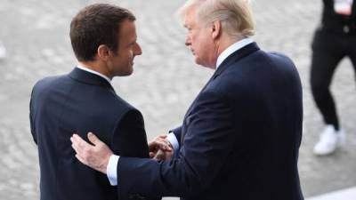 El presidente francés, Emmanuel Macron y el presidente de EEUU, Donald Trump. AFP/Archivo