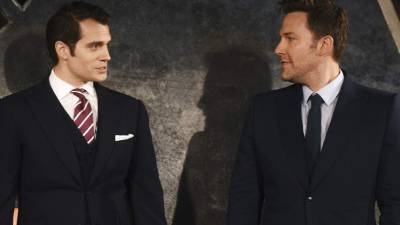 Los actores Ben Affleck y Henry Cavill.