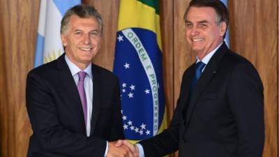 El presidentes de Argentina, Mauricio Macri, y su homólogo brasileño, Jair Bolsonaro . AFP