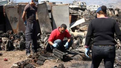 Un equipo especializado de inspectores de la DPI, Bomberos y del Ministerio Público hacen recuento de daños.