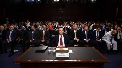WASHINGTON, DC - JUNE 08: Former FBI Director James Comey testifies before the Senate Intelligence Committee in the Hart Senate Office Building on Capitol Hill June 8, 2017 in Washington, DC. Comey said that President Donald Trump pressured him to drop the FBI's investigation into former National Security Advisor Michael Flynn and demanded Comey's loyalty during the one-on-one meetings he had with president. Chip Somodevilla/Getty Images/AFP== FOR NEWSPAPERS, INTERNET, TELCOS & TELEVISION USE ONLY ==