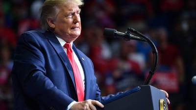US President Donald Trump speaks during a campaign rally at the BOK Center on June 20, 2020 in Tulsa, Oklahoma. - Hundreds of supporters lined up early for Donald Trump's first political rally in months, saying the risk of contracting COVID-19 in a big, packed arena would not keep them from hearing the president's campaign message. (Photo by Nicholas Kamm / AFP)