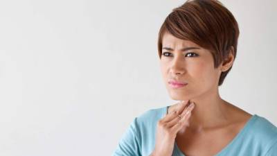 sick woman with sore throat, inflammation with blank area for text or copy space