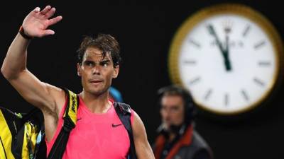 Spain's Rafael Nadal walks off the court after losing against Austria's Dominic Thiem during their men's singles quarter-final match on day ten of the Australian Open tennis tournament in Melbourne on January 29, 2020. (Photo by William WEST / AFP) / IMAGE RESTRICTED TO EDITORIAL USE - STRICTLY NO COMMERCIAL USE