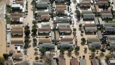 Cientos de casas se vieron afectadas por las inundaciones en San José. AFP.