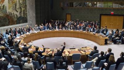 In this image released by the UN, members of the Security Council vote on December 23, 2016, on a resolution to stop Israeli settlements. The Council on Friday demanded that Israel halt its settlement activities in Palestinian territory, in a resolution adopted after the US refrained from vetoing the measure condemning its closest Middle East ally. In a rare step, the US instead abstained, allowing the measure to pass by a vote of 14 in favor in the 15-member council. / AFP PHOTO / SC Chamber / Manuel ELIAS / RESTRICTED TO EDITORIAL USE - MANDATORY CREDIT 'AFP PHOTO / UN / Manuel ELIAS' - NO MARKETING NO ADVERTISING CAMPAIGNS - DISTRIBUTED AS A SERVICE TO CLIENTS