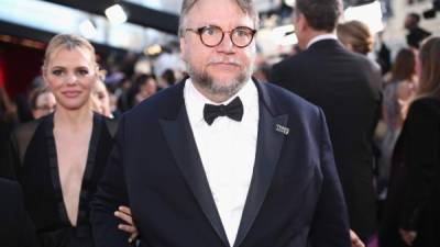 Guillermo del Toro fue acompañado por Kim Morgan en pasados premios Óscar. Christopher Polk/Getty Images/AFP