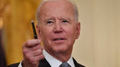Biden pide a las agencias de Inteligencia de EEUU investigar el origen del coronavirus./AFP.