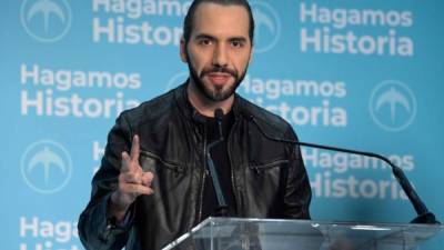 El Salvador presidential candidate Nayib Bukele of the Great National Alliance (GANA) speaks to the media after proclaiming himself as winner of the presidential election in San Salvador on February 3, 2019. - Nayib Bukele, the popular former mayor of San Salvador, claimed victory on February 3 in the Central American country's presidential elections. (Photo by MARVIN RECINOS / AFP)