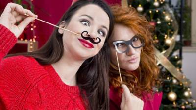 Two girls fooling around on Christmas