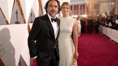 Alejandro Gonzáles Iñárritu y Maria Eladia Hagerman en la 88 entrega de los premios Oscar.