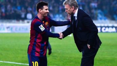 David Moyes saluda a Lionel Messi.