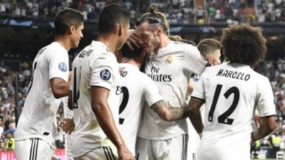 Jugadores del Real Madrid festejando el gol de Isco. FOTO AFP.