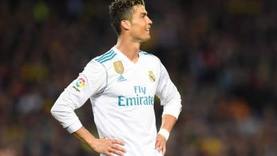 Cristiano Ronaldo se lesionó al anotarle al FC Barcelona. FOTO AFP / LLUIS GENE
