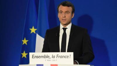 French presidential election candidate for the En Marche ! movement Emmanuel Macron delivers a speech at his campaign headquarters in Paris on May 7, 2017, after the second round of the French presidential election. / AFP PHOTO / POOL / Lionel BONAVENTURE