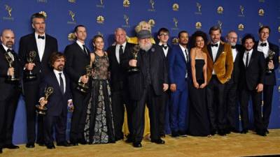 LOS ANGELES, CA - SEPTEMBER 17: Cast and crew of Outstanding Drama Series winner 'Game of Thrones' pose in the press room during the 70th Emmy Awards at Microsoft Theater on September 17, 2018 in Los Angeles, California. Frazer Harrison/Getty Images/AFP