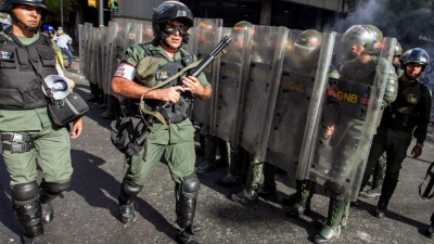 Venezuelan President Nicolas Maduro delivers a speech during a campaign rally in Charallave, about 65 km from Caracas, on May 15, 2018. Venezuela holds presidential elections on May 20, in which Maduro is seeking a second six-year term. / AFP PHOTO / Juan BARRETO