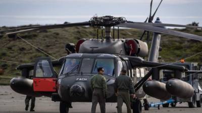 La Fuerza Aérea chilena, con el apoyo de varios países, encabeza la búsqueda del avión militar perdido en la Antártida./AFP.