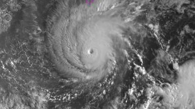 Esta imagen satelital obtenida de la Administración Nacional Oceánica y Atmosférica (NOAA) muestra el huracán Lane. AFP