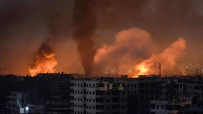 la agencia oficial SANA informó de que las defensas antiaéreas de Siria habían destruido decenas de misiles lanzados por Israel. AFP/Archivo