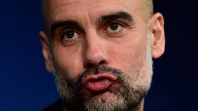 El entrenador español del Manchester City, Pep Guardiola, celebra una conferencia de prensa en el estadio Santiago Bernabeu de Madrid el 25 de febrero de 2020, en la víspera del partido de fútbol de la UEFA Champions League contra el Real Madrid CF. / AFP / JAVIER SORIANO