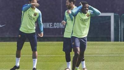 Los jugadores del FC Barcelona, Neymar jr, Leo Messi y Samuel Umtiti, durante un entrenamiento en la ciudad deportiva Joan Gamper, esta semana. EFE.