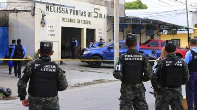 Escena. El crimen en el taller fue perpetrado por dos hombres que llegaron en una motocicleta.