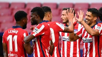 Luis Suárez en 20 minutos marcó un doblete en su debut con el Atlético de Madrid. Foto AFP.