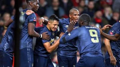 Los jugadores del Manchester United celebran el gol de Alexis Sánchez contra el Arsenal. Foto AFP