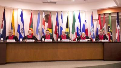 'La justicia sería ver a las personas responsables, tanto materiales como intelectuales (del crimen), que paguen o purguen esa pena', dijo el hijo de la víctima.