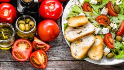 Vegetarian salad, vegetable greek salads, top view, weight loss concept