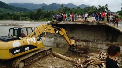 La carretera CA-13 es de vital importancia, pues por allí sale mercadería, gas y contenedores rumbo a Guatemala.