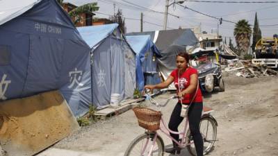 Fotografía del 12 de septiembre de 2018 que muestra las tiendas de campaña donadas por el Gobierno chino tras el terremoto del 19 de septiembre de 2017, en Iztapalapa, Ciudad de México (México). EFE