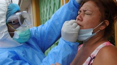 Los síntomas más graves se presentan solamente en personas que padecen enfermedades de base, como diabetes e hipertensión. (Photo by Jose SANCHEZ / AFP)