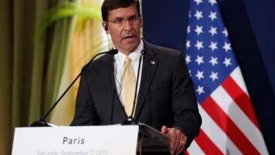 (FILES) In this file photo US Secretary of Defense Mark Esper waits for the arrival of Finland's Minister of Defense Antti Kaikkonen and Sweden's Defense Minister Peter Hultqvist during an enhanced honor cordon at the Pentagon December 10, 2019 in Washington, DC. - President Donald Trump on November 9, 2020 announced by tweet that he had fired his defense secretary Mark Esper, further destabilizing a government already navigating Trump's refusal to concede election defeat to Democrat Joe Biden. 'Mark Esper has been terminated. I would like to thank him for his service,' Trump said on Twitter, announcing his replacement by Christopher Miller, the current head of the National Counterterrorism Center. (Photo by Olivier Douliery / AFP)