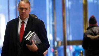 FILE - DECEMBER 15, 2018: It was reported that Interior Secretary Ryan Zinke has notified the White House that he intends to step down by the end of the year December 15, 2018. WASHINGTON, DC - DECEMBER 03: US Secretary of the Interior Ryan Zinke arrives at the US Capitol prior to the service for former President George H. W. Bush on December 03, 2018 in Washington, DC. A WWII combat veteran, Bush served as a member of Congress from Texas, ambassador to the United Nations, director of the CIA, vice president and 41st president of the United States. A state funeral for Bush will be held in Washington over the next three days, beginning with him lying in state in the U.S. Capitol Rotunda until Wednesday morning. Shawn Thew - Pool/Getty Images/AFP