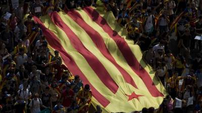 Este domingo los catalanes fueron a las urnas a responder '¿Quiere usted que Cataluña sea un Estado independiente en forma de República?' / AFP/ Josep LAGO