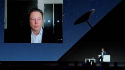 Tesla CEO Elon Musk gives a keynote speech by video conference at the Mobile World Congress (MWC) fair in Barcelona on June 29, 2021. (Photo by Josep LAGO / AFP)