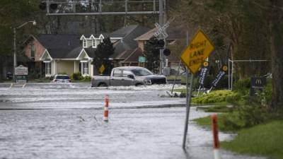 Las inundaciones han dejado incomunicadas y atrapadas a varias personas en Luisiana./AFP.