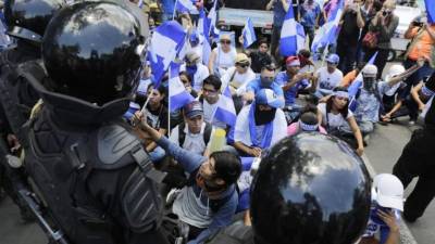 Antimotines impiden las manifestaciones en Managua./AFP.