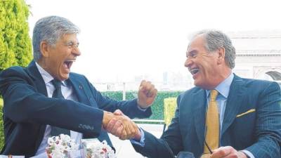 Maurice Levy, presidente ejecutivo de Publicis (izq.) y John Wren, de Omnicom