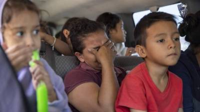 Migrantes hondureños que desistieron a recibir asilo en EEUU regresaron a Honduras en un autobús proporcionado por las autoridades mexicanas./AFP.