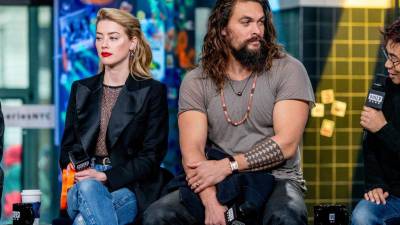 Amber Haerd y Jason Momoa, protagonistas de “Aquaman”.