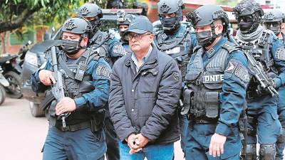 <b><span class=mln_uppercase_mln>Audiencia.</span></b> Midence Martínez escoltado por la Policía.<span class=mln_uppercase_mln> </span>