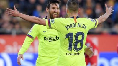Messi festejando su anotación con Jordi Alba. FOTO AFP.